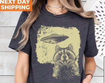 Funny Raccoon UFO Shirt: Retro Meme Graphic Tee