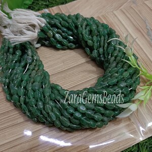 Green Strawberry Quartz Beads: Smooth Oval Gemstone Strand (6x9-7x10mm)