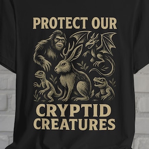 Cryptid T-Shirt Protect Our Cryptids Tee Bigfoot Jersey Devil Lizard People Jackalope Shirt Black Tee Paranormal Style Gift For Fan