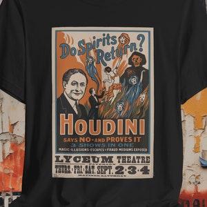 Front of shirt showing a bold graphic of the "Do Spirits Return?" show poster featuring Harry Houdini, styled in vintage colors on a Bella + Canvas unisex T-shirt.