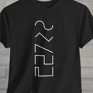 May include: Black t-shirt with a white geometric design. The design includes a curved line, angled lines, and a square. The shirt is made of a soft material and is suitable for casual wear.