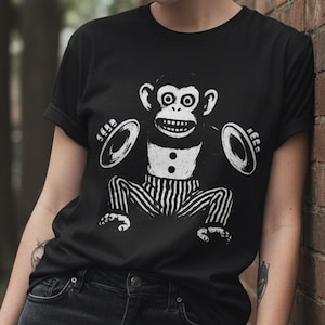 Cymbal Monkey Shirt Creepy Toy Graphic Tee Black T-Shirt Scary Monkey Design Horror Aesthetic Tee Gift For Weird Toy Collector