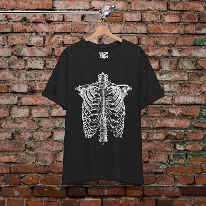Horror T-shirt Skeleton Ribcage Metal Grunge Emo Alternative Goth Gothic Punk Tee Dark Aesthetic Spooky Skeleton Graphic Halloween Bones Fitted Tee - Bella+