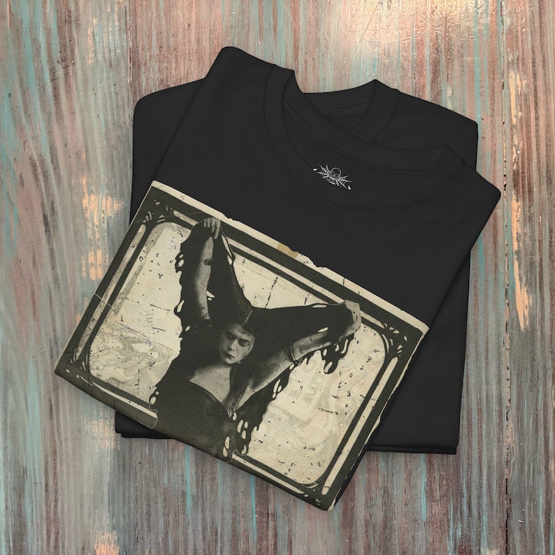 a black shirt with a picture of a woman on it