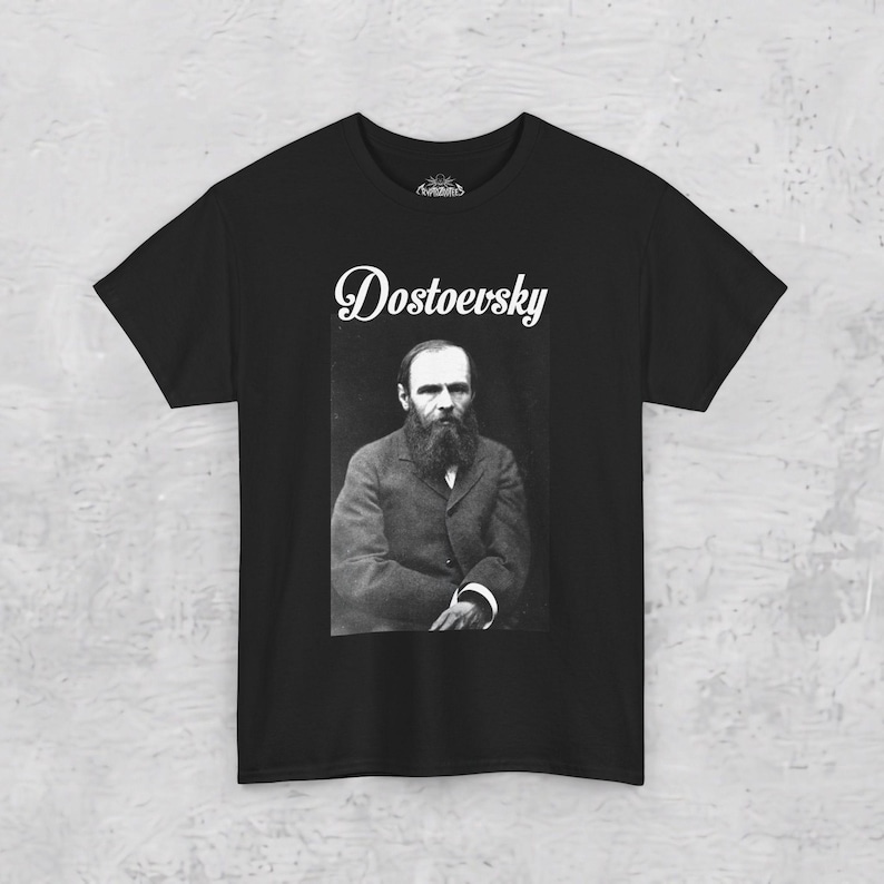 a black t - shirt with a picture of a man in a suit