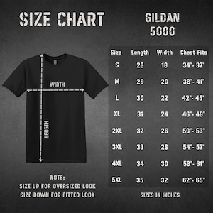 May include: Black Gildan 5000 t-shirt with a size chart. The chart lists sizes S to 5XL, with measurements in inches for length, width, and chest fit. The text "SIZE CHART" and "GILDAN 5000" are at the top. The note says to size up for an oversized look and size down for a fitted look.