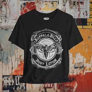 Front of shirt showing a vintage-style apothecary label with "Buffalo Bill's Body Lotion" in Gothic fonts, referencing Silence of The Lambs, perfect for horror movie fans.