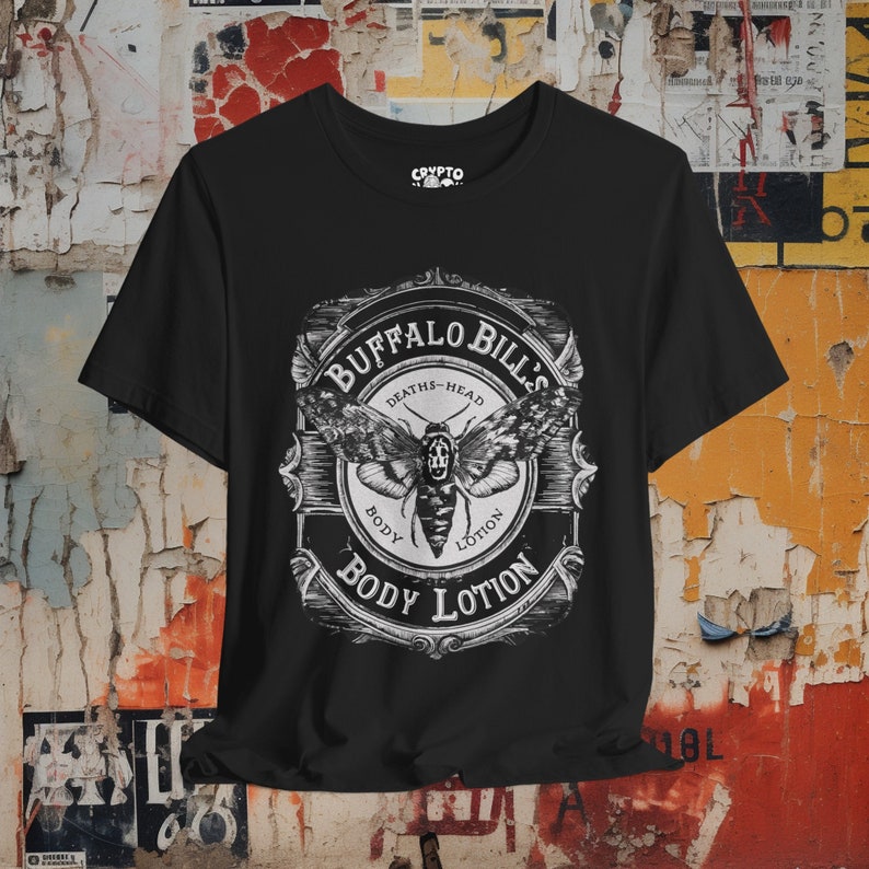 Front of shirt showing a vintage-style apothecary label with "Buffalo Bill's Body Lotion" in Gothic fonts, referencing Silence of The Lambs, perfect for horror movie fans.