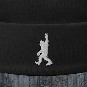 Bigfoot Peace Sign Beanie Sasquatch Embroidered Hat Black Winter Cap Cryptid Warm Headwear Unique Gift for Bigfoot and Nature Lovers