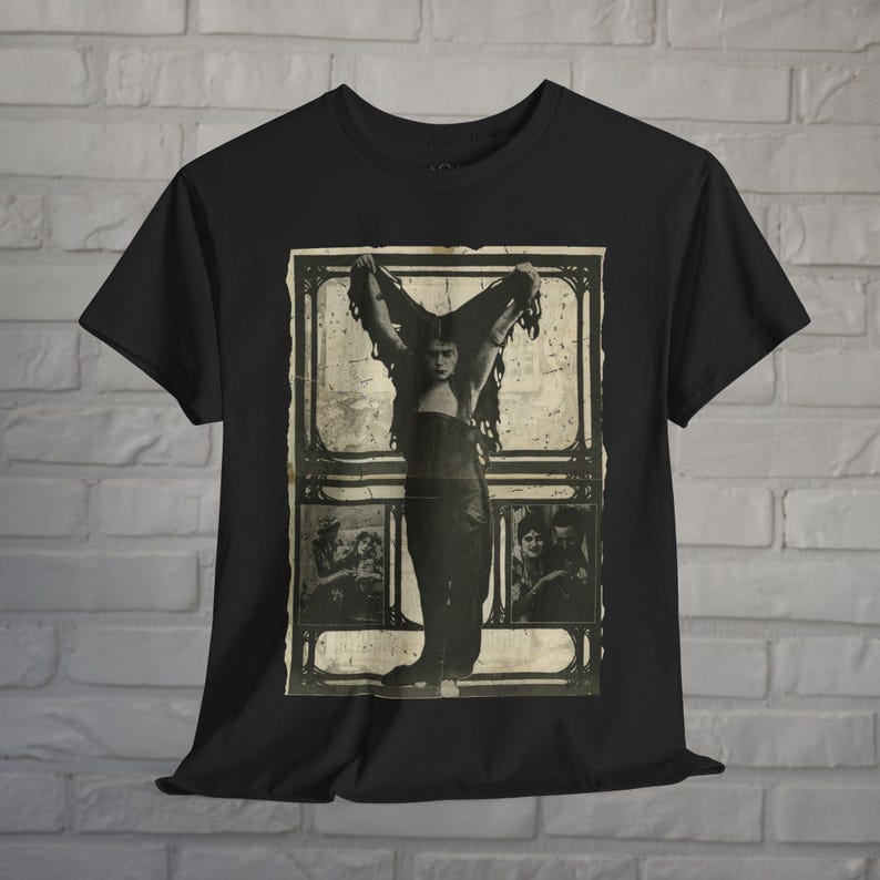 a black t - shirt with a picture of a woman on it