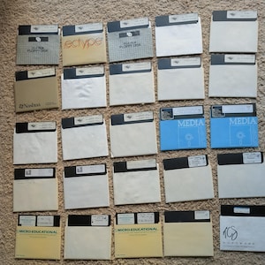 98 5.25'' 1970s-1980s floppy discs with programs, documents, utilities & more