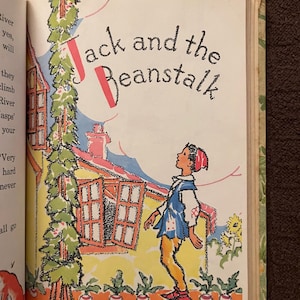 May include: A colorful illustration from a children's book titled "Jack and the Beanstalk." The image features a young boy in a blue tunic and red shoes, looking up at a house with open windows. The text "Jack and the Beanstalk" is displayed at the top.