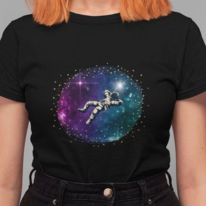 Relaxing Astronaut Shirt / Astronaut in Space Shirt / Celestial Purple Blue Galaxy Astronaut Short Sleeve Tee