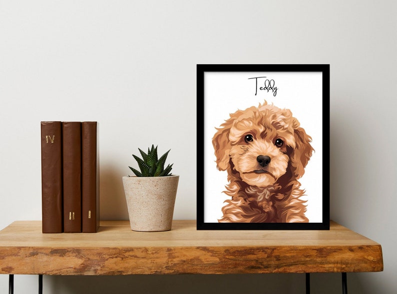 Framed custom pet portrait displayed on a wooden shelf next to books. It features a realistic vector illustration of a Golden Doodle dog named "Teddy," capturing the pet's fluffy texture and happy expression.