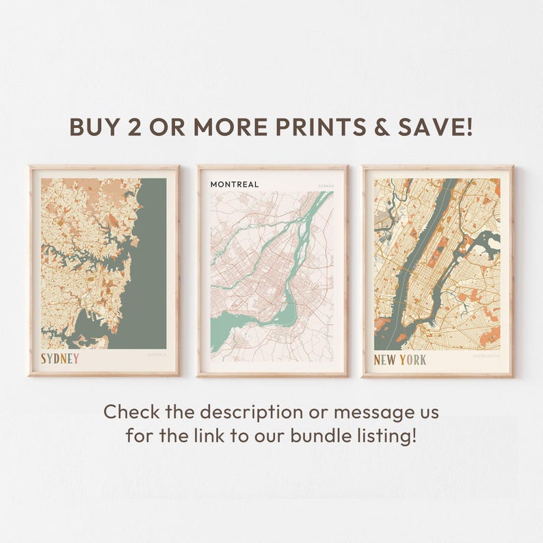 a white wall with three framed maps on it