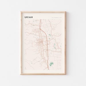 May include: Framed map print of Ukiah, California, USA. The map features a detailed street layout in brown against a light beige background. The city name is printed in black at the top left, with "California, USA" on the right.