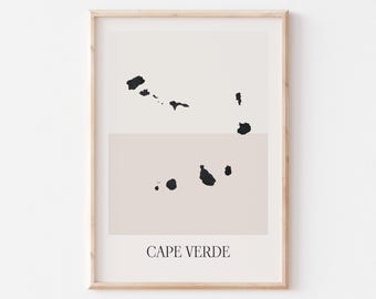 May include: A framed print featuring a minimalist map of Cape Verde. The artwork has a light beige background with a horizontal tan band. Black shapes represent the islands, and the text "CAPE VERDE" is at the bottom.