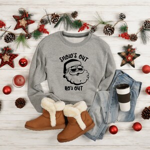 Sneeuwt uit kersttrui sweatshirt t-shirt grappige kerst plakkerige kersttrui