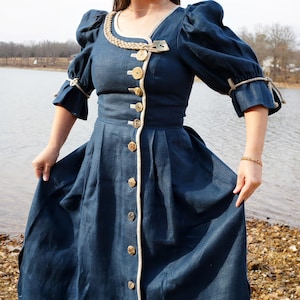 alpine dress with close fitting bodice The humble dirndl, with its bodice, white blouse, apron and full skirt, is celebrated in Austrian exhibition
