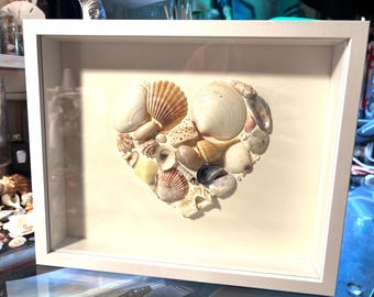Heart of seashells frame #25-1.  White - 10 5/8 x 8 5/8”, 1-3/4” deep