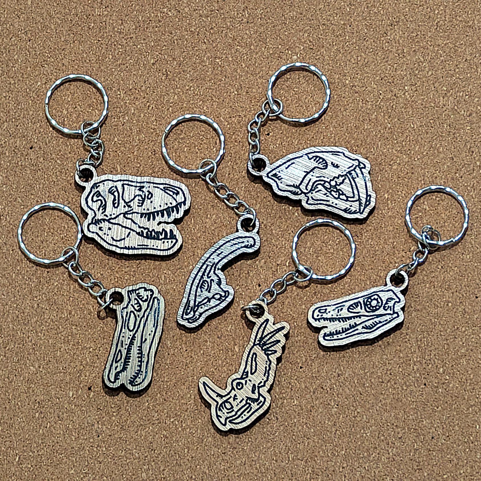 T Rex Keychains Dino Skull Keychains | T-rex, Baryonyx, Smilodon, Parasaur, Styracosaur ...