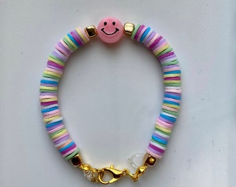 Pulseira de miçangas com rosto sorridente