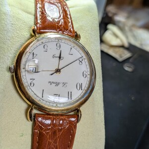 Vintage Le Montre France Quartz Watch 33mm Gold Tone Date Window New Battery Running Leather Strap French Dress Watch. UNISEX