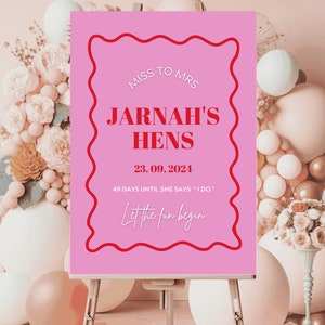 May include: Pink and red sign with the text "Miss to Mrs. Jarnah's Hens 23.09.2021 49 days until she says "I do" Let the fun begin"