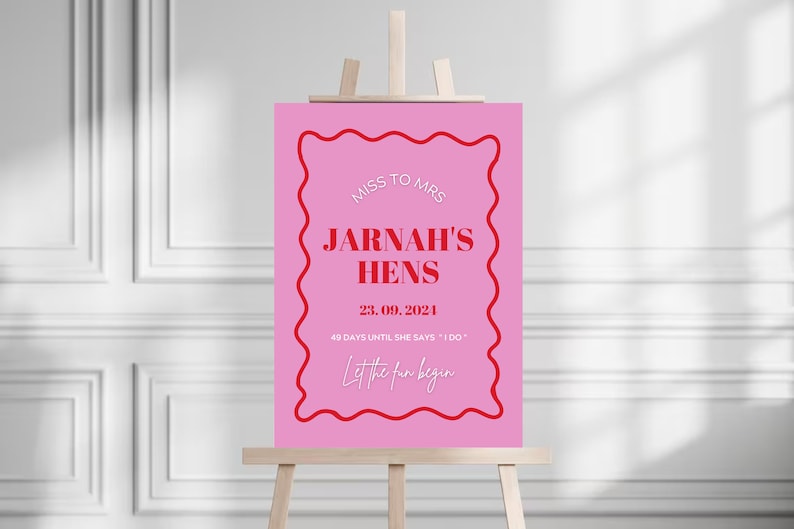 May include: Pink sign with a red border and white text that says "Miss to Mrs. Jarnah's Hens 23.09.2021 49 days until she says "I do" Let the fun begin"
