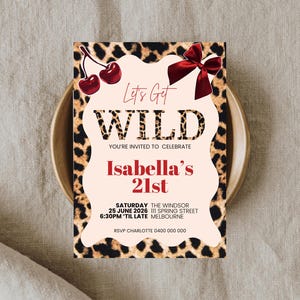 May include: A party invitation with a leopard print border and a light pink center. The text "Let's Get WILD" is at the top, with "Isabella's 21st" in red. Includes event details: date, time, location, and RSVP information.