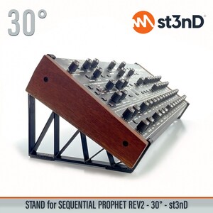 May include: A black metal stand with a wooden top, angled at 30 degrees, designed to support a Sequential Prophet Rev2 synthesizer. The stand is labeled "st3nD" and "STAND for SEQUENTIAL PROPHET REV2 - 30° - st3nD".