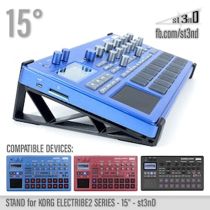 May include: A blue Korg Electribe2 sampler sits on a black stand, angled at 15 degrees. The stand is designed for the Electribe2 series. The image also shows compatible devices. The text "st3nD" and "fb.com/st3nd" are visible.