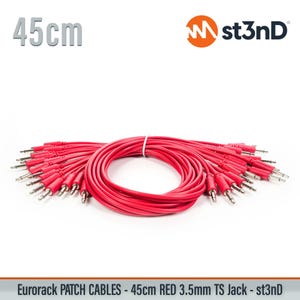 May include: A bundle of red 3.5mm TS jack patch cables, each 45cm (17.7 inches) long, for Eurorack systems. The cables are coiled together and secured with a white tie. The st3nD logo is visible in the upper right corner.
