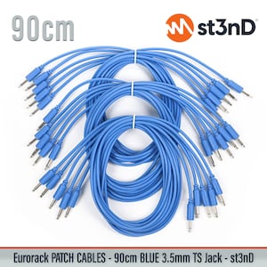 May include: Blue 3.5mm TS jack patch cables, each 90cm long, bundled together. The cables are a vibrant blue color, with silver connectors. The product is labeled "st3nD" and "EuroRack Patch Cables".