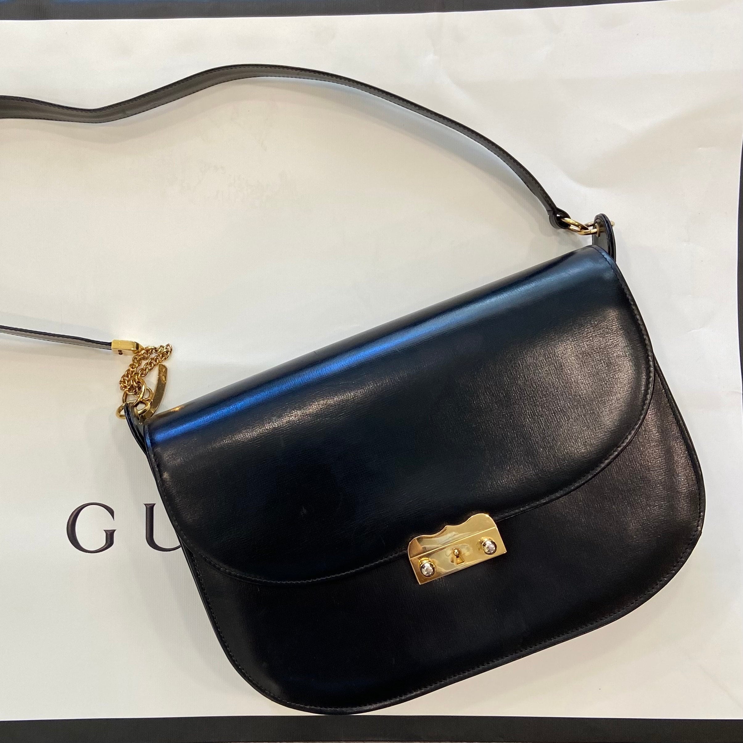Gucci Authenticated Leather Clutch Bag