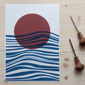 Lino print sun and sea