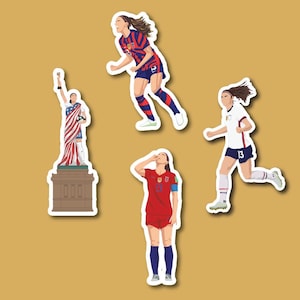 May include: Four illustrated stickers featuring female soccer players. One sticker shows a player in a red and blue uniform with a white star on the chest. Another sticker shows a player in a white and blue uniform with a blue star on the chest. The third sticker shows a player in a red and blue uniform with a white star on the chest. The fourth sticker shows a player in a red, white, and blue uniform holding a soccer ball.