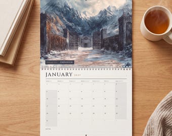 May include: A wall calendar for January 2027 titled Endovier, featuring a spiral-bound design. The top section displays an illustration of stone gates leading to snow-covered mountains. The bottom section shows a grid for the month of January 2027.