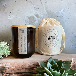 Luxurious wooden wick candles in natural muslin cotton bag