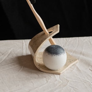 Toothbrush holder + soap dish