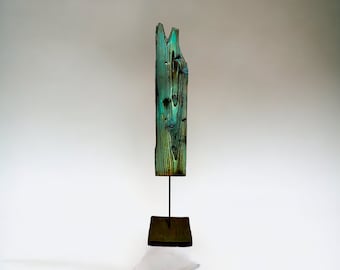 Wooden sculpture made from at least 100 years old wood, flamed old wood turquoise