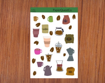 May include: A sheet of coffee-themed stickers featuring various coffee cups, mugs, coffee beans, and coffee bags. The stickers are on a white background with the text "PaperQuestCo" at the top.