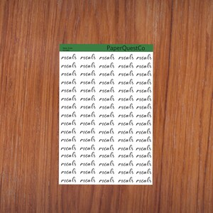 May include: A sheet of stickers with the word "meals" written in cursive script, repeated multiple times. The sheet is white with a green border and the text "PaperQuestCo" in the top right corner.