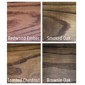 May include: Four wood stain samples: Redwood Ember, Smoked Oak, Toasted Chestnut, and Brownie Oak. Each sample displays the wood grain and color variations. The names of the stains are written in white text below each sample.