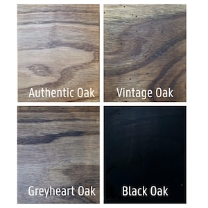 May include: Four wood samples with different finishes: Authentic Oak, Vintage Oak, Greyheart Oak, and Black Oak. Each sample has a unique grain pattern and color, ranging from light brown to dark black. The names of the finishes are displayed below each sample.