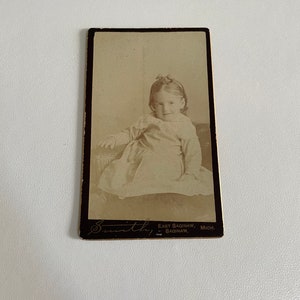 Early 1900’s cabinet card of girl in white