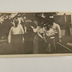 Early 1900’s dark group photo