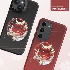 May include: Two phone cases with a red and white cartoon character on a black and red background. The text "designed by MINI TIGRESS" is in the top right corner of the image. The text "イレイ" is on both cases.