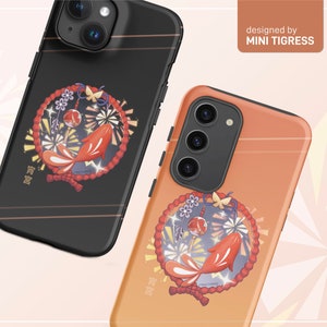 May include: Two phone cases with a colorful illustration of a red fish, fireworks, and a butterfly. The text "招財進寶" is on both cases. The cases are designed by MINI TIGRESS.