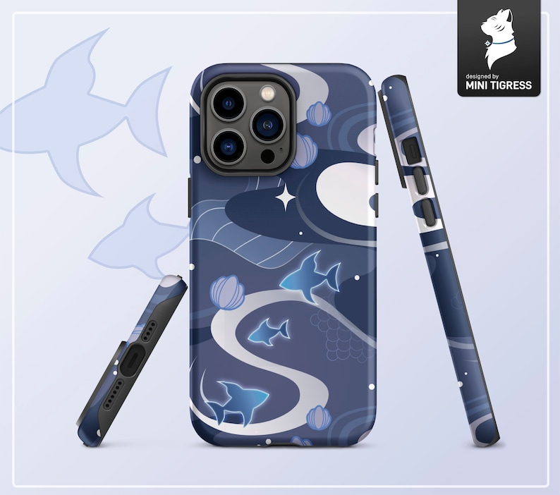 May include: A blue and white phone case with a design of fish and waves. The case has a black camera bump with three lenses. The text "designed by MINI TIGRESS" is printed on the case.